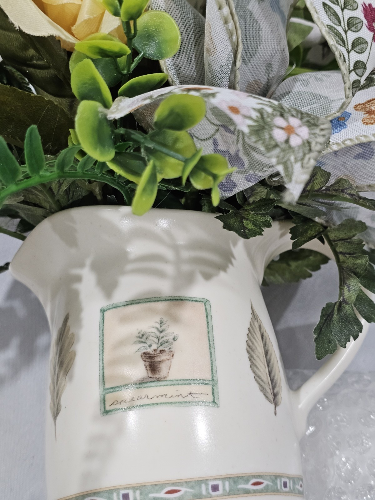 Artificial Flower Arrangement Soft Yellow Roses in a Homey Green & White vase