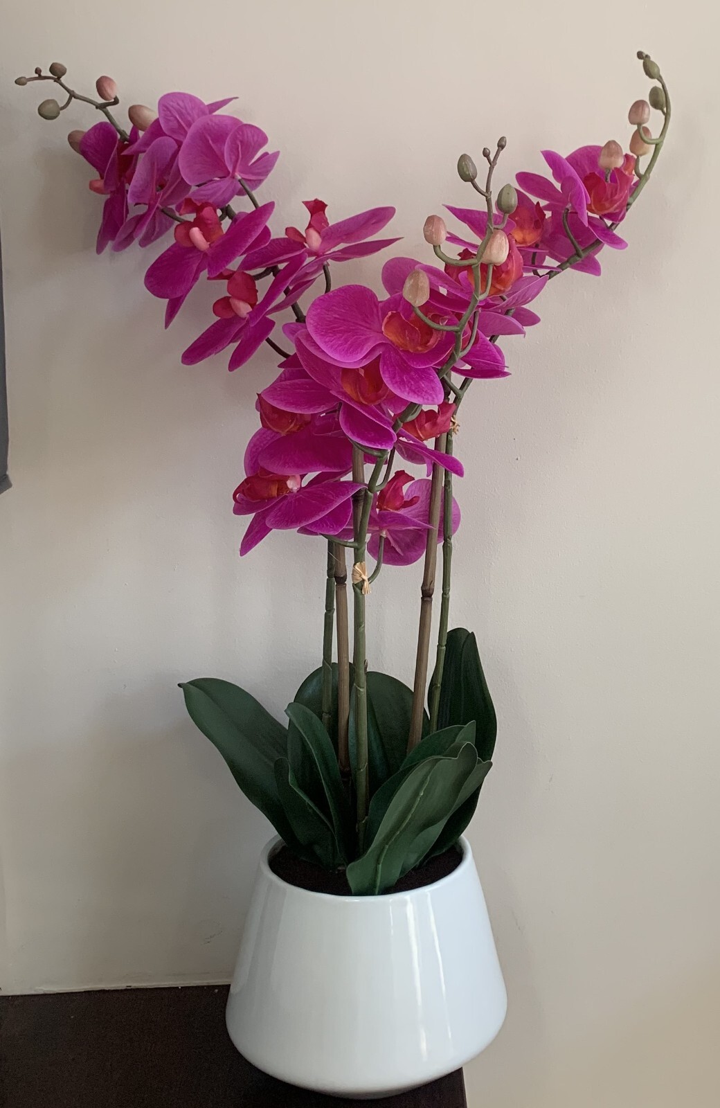 CG Hunter natural-look faux pink flowers orchid, bamboo-like post terracotta pot