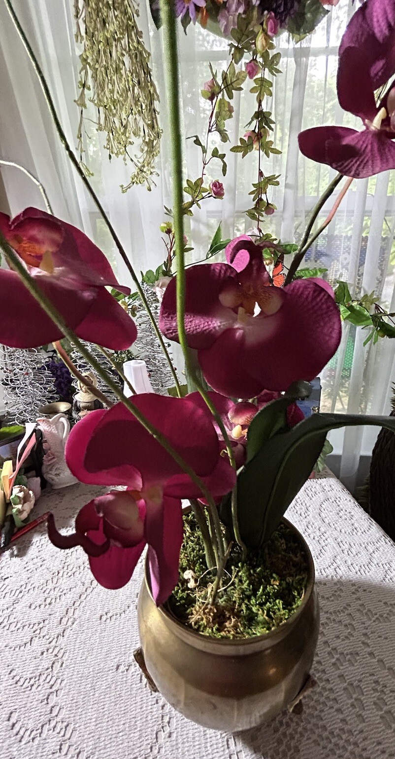 Artificial Orchids In Brass Urn With 3 Feet 20” Tall Darker Colors Due To Light