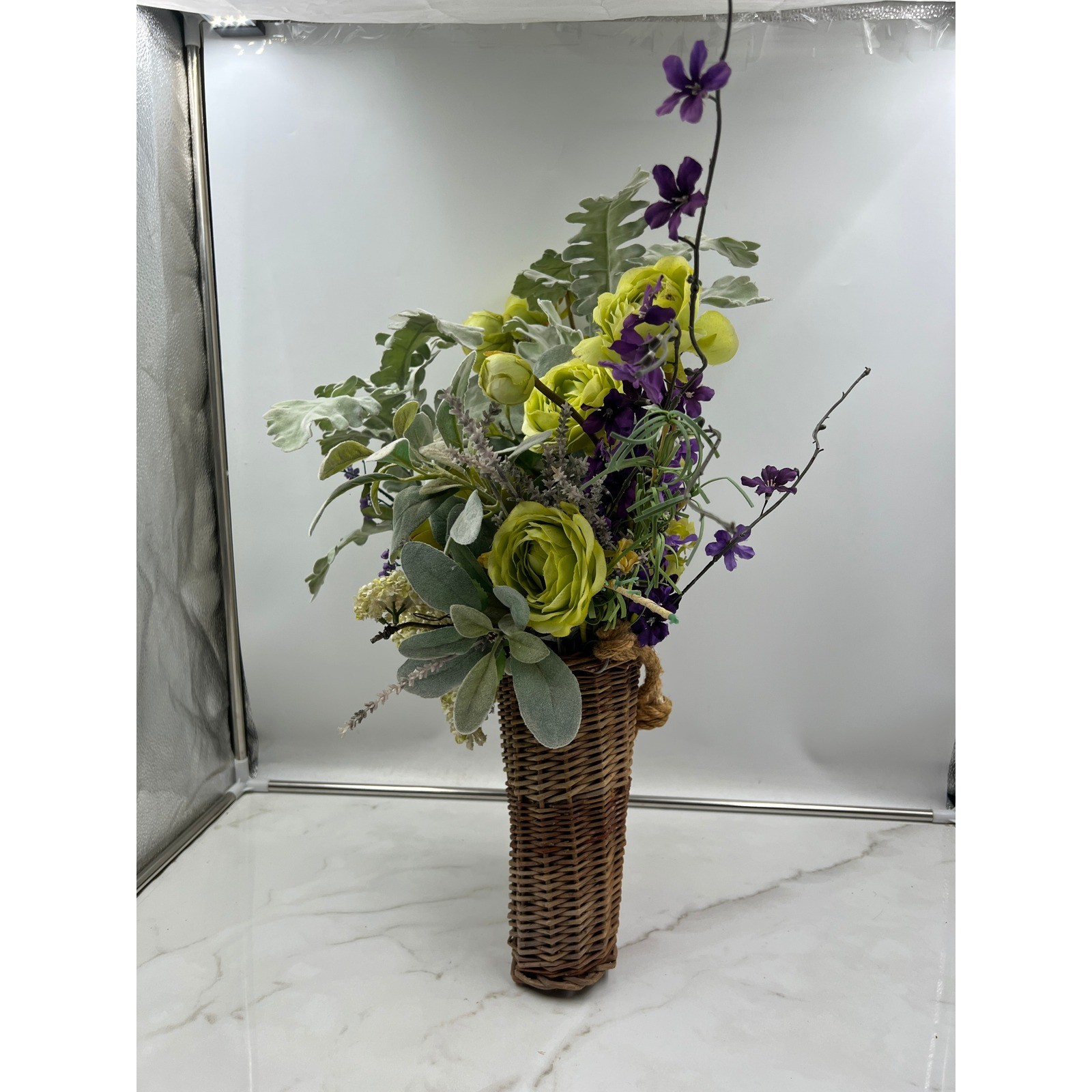 Artificial Lime Green Ranunculus & Purple Floral Arrangement in Wicker Basket