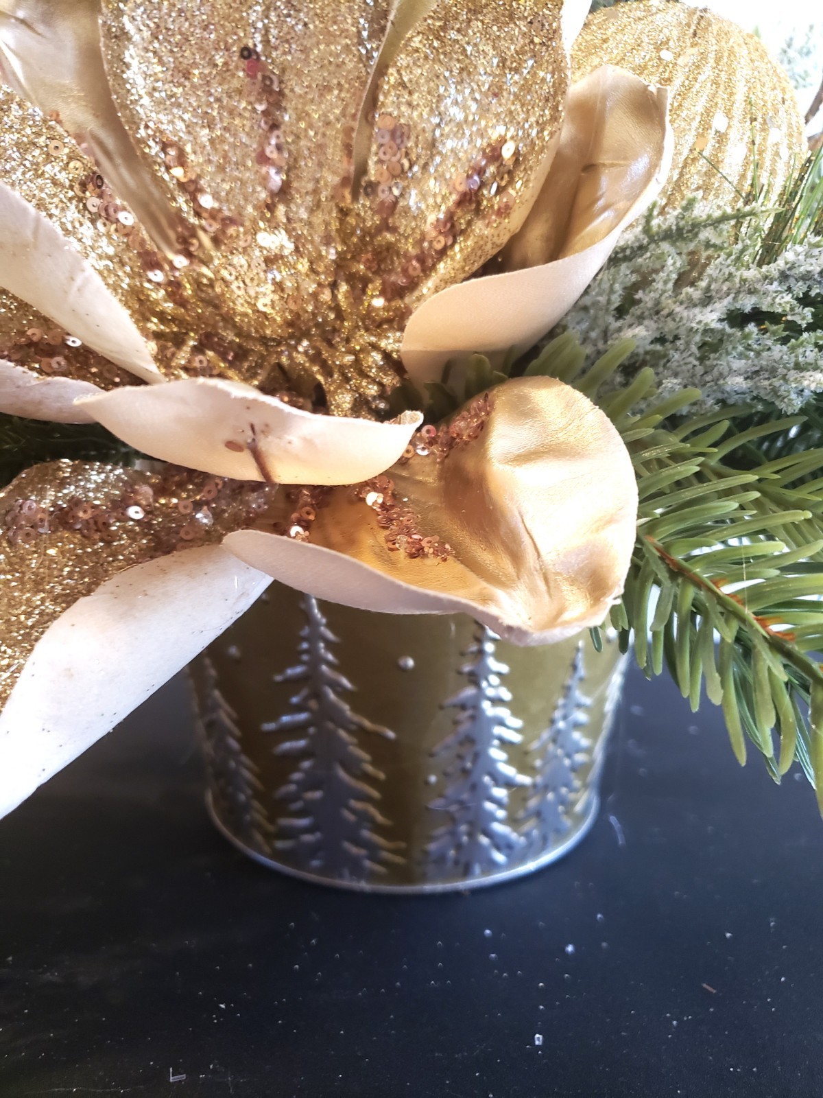 Gold magnolia Christmas floral arrangement, holiday floral arrangement