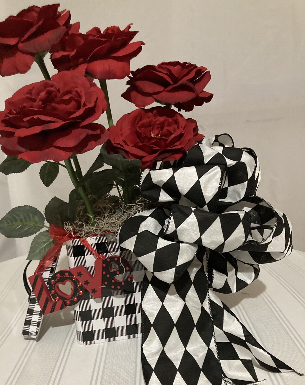 Valentine Red Roses With Black & White Checked Container