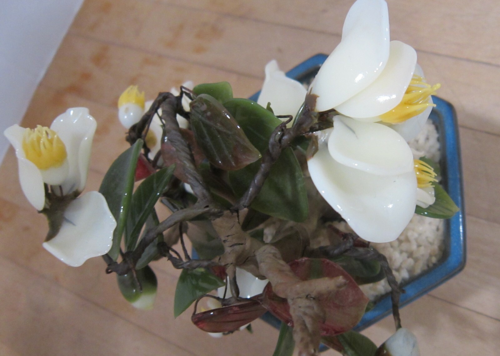 Vintage Japan glass flowers in blue bowl – 7-1/2″ high – yellows & greens VGC