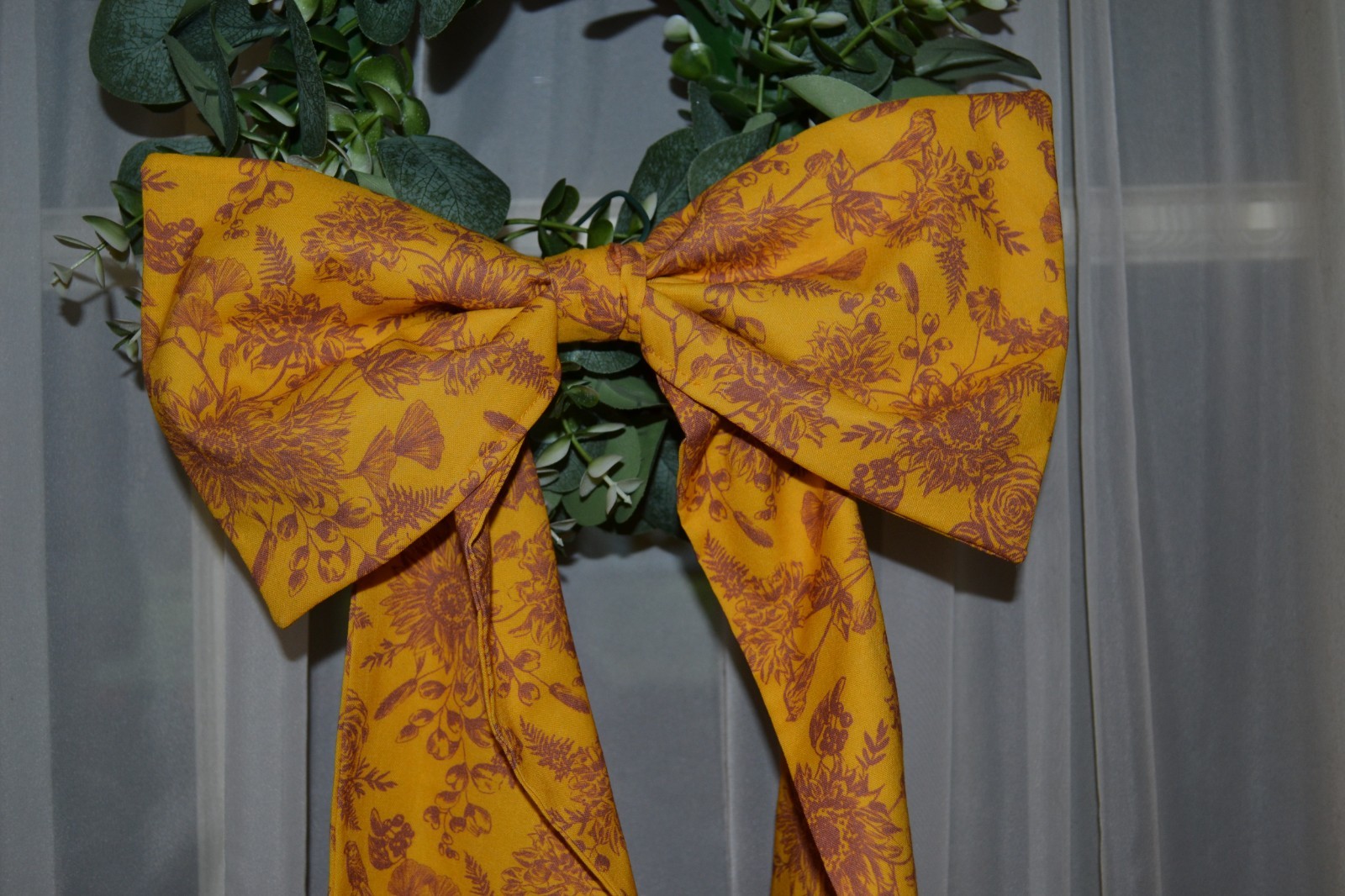 Wreath Sash with bow is Made In A Sunflower Toile Cotton Fabric Yellow In Color