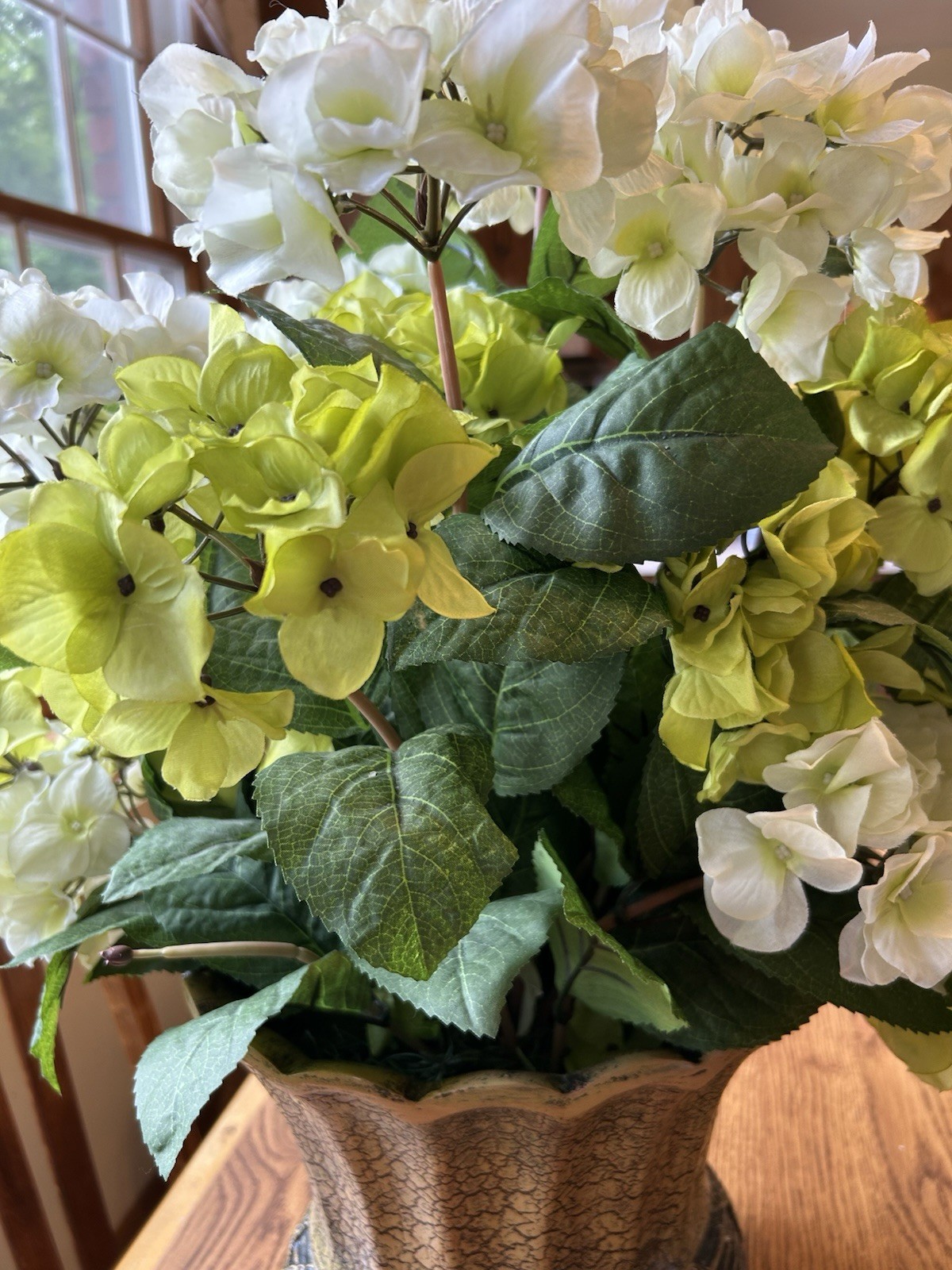 Large Floral Arrangement With Ornate Bottom