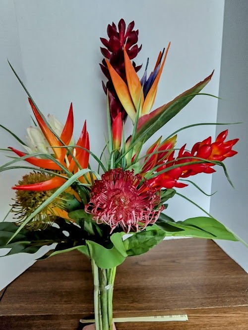 Artificial tropical floral vase arrangement