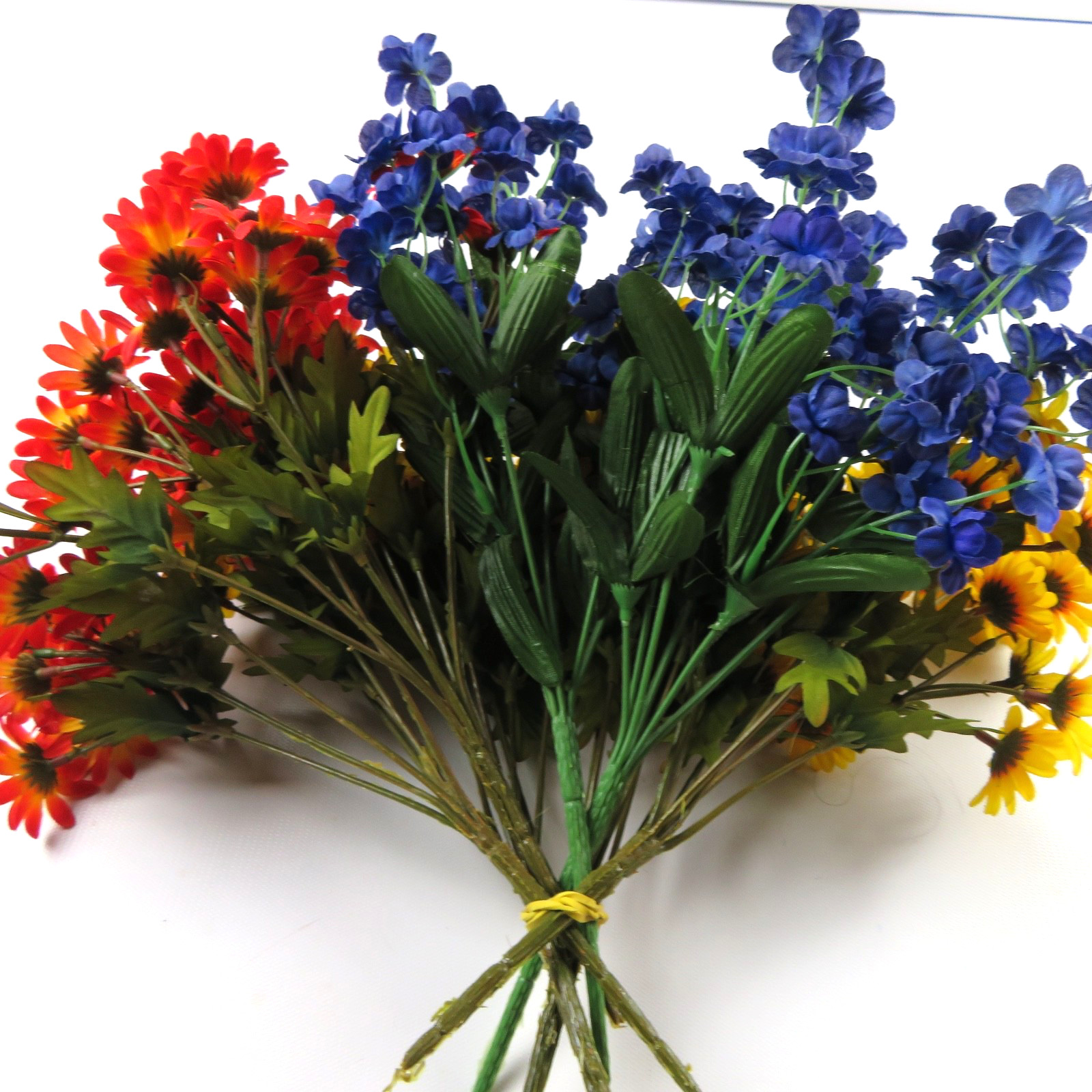 Mixed bouquet of artificial flowers, yellow & orange daisies, blue, 7 bundles