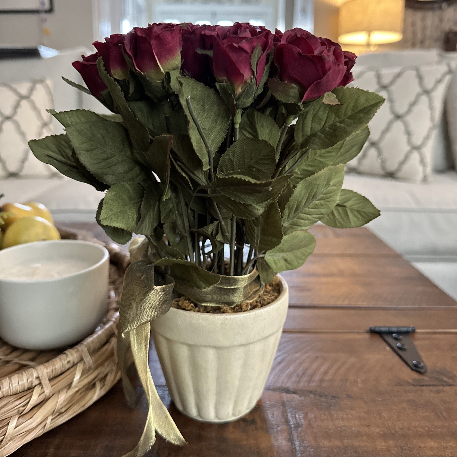 ARTIFICIAL 21 SILK RED ROSE BUDS TIED WITH A BOW IN BEIGE POT