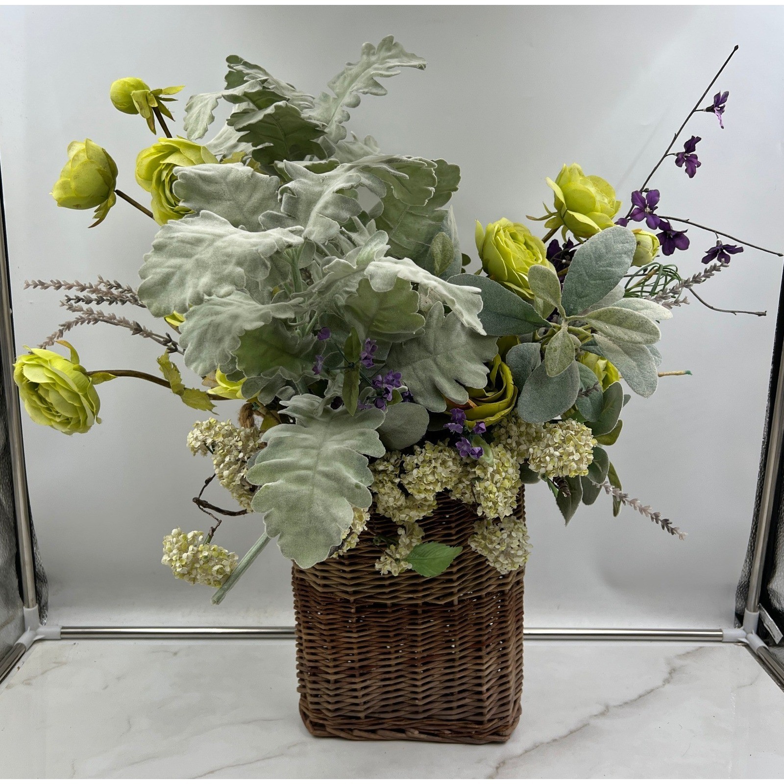 Artificial Lime Green Ranunculus & Purple Floral Arrangement in Wicker Basket