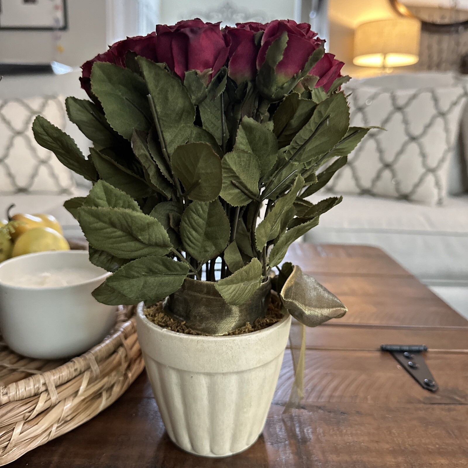 ARTIFICIAL 21 SILK RED ROSE BUDS TIED WITH A BOW IN BEIGE POT