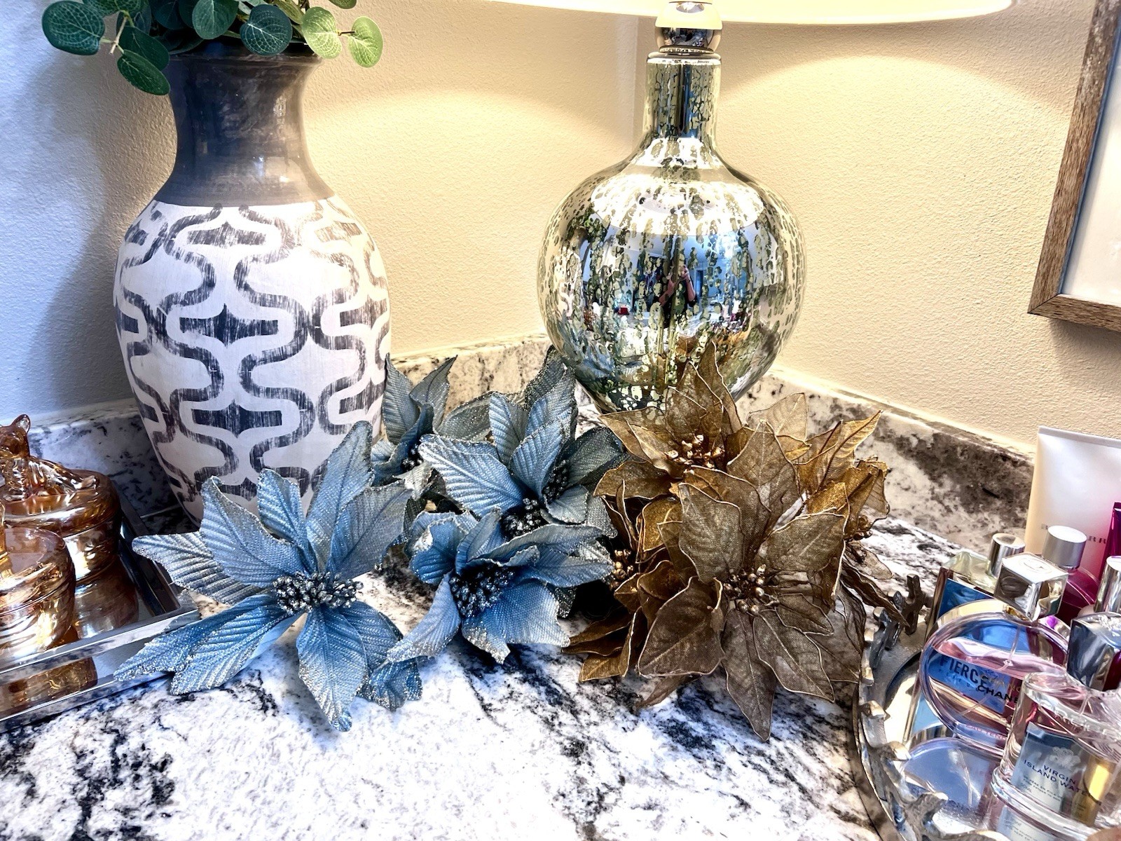 poinsettia flowers in a metallic Blue & silver used as decorations for Christmas
