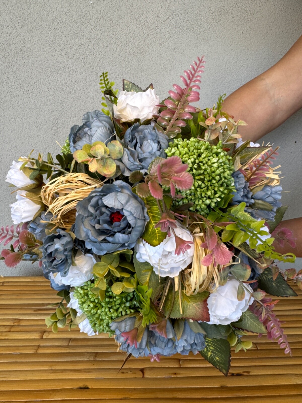 Blue and white flower arrangement in a vase , width 12’, height 15’, home decor.