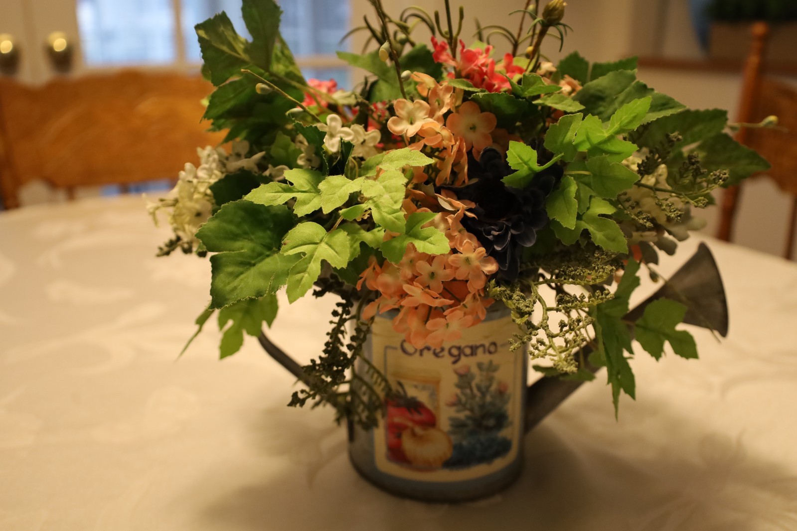 Spring Multicolor Artificial Floral in a Watering Can Table Decoration