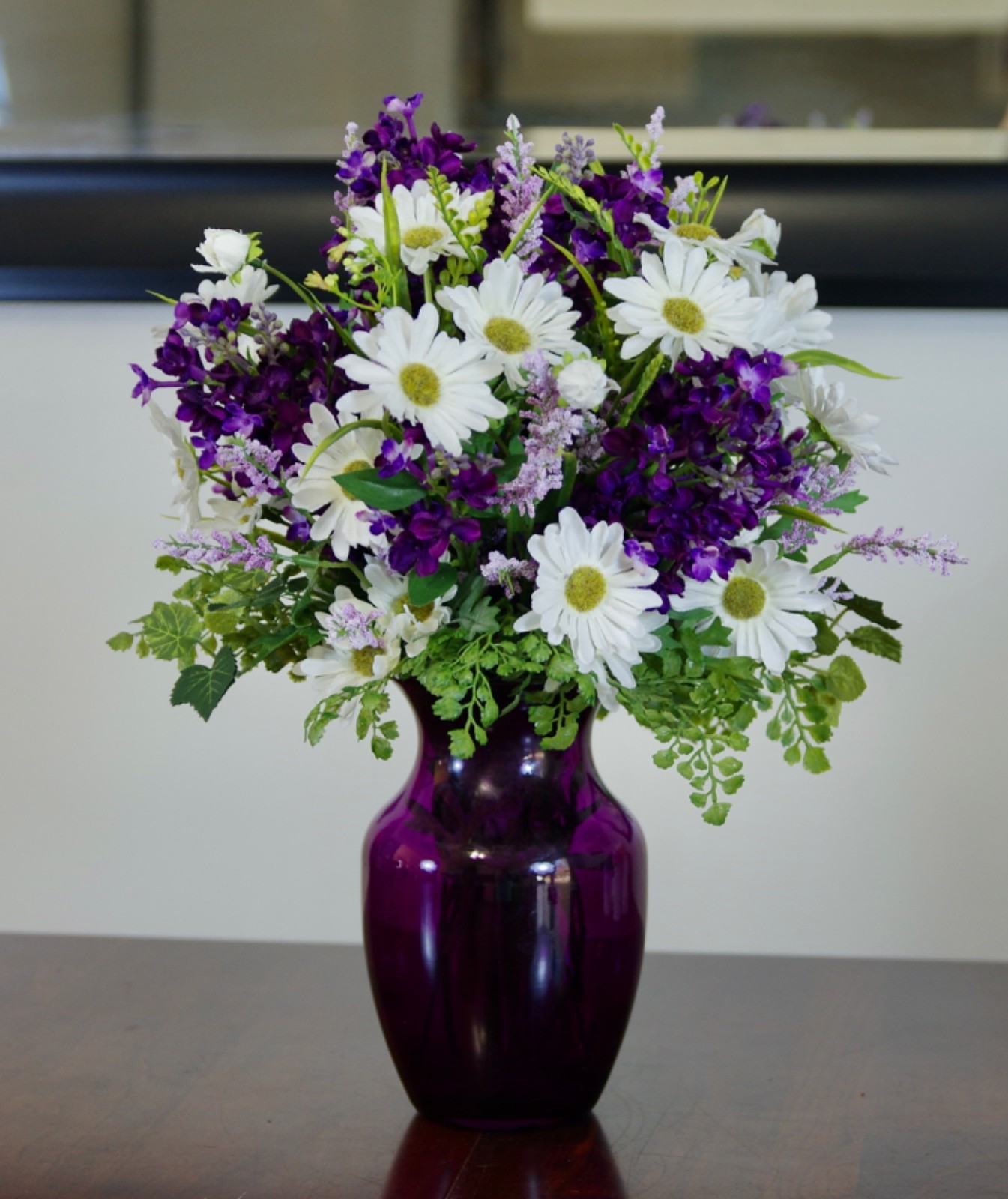 Silk Purple Lilacs and White Daisies Arrangement in a Purple Glass Vase