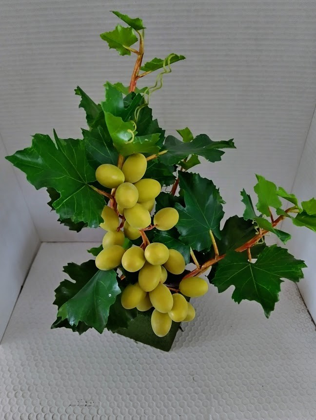 Artificial grape vine tree