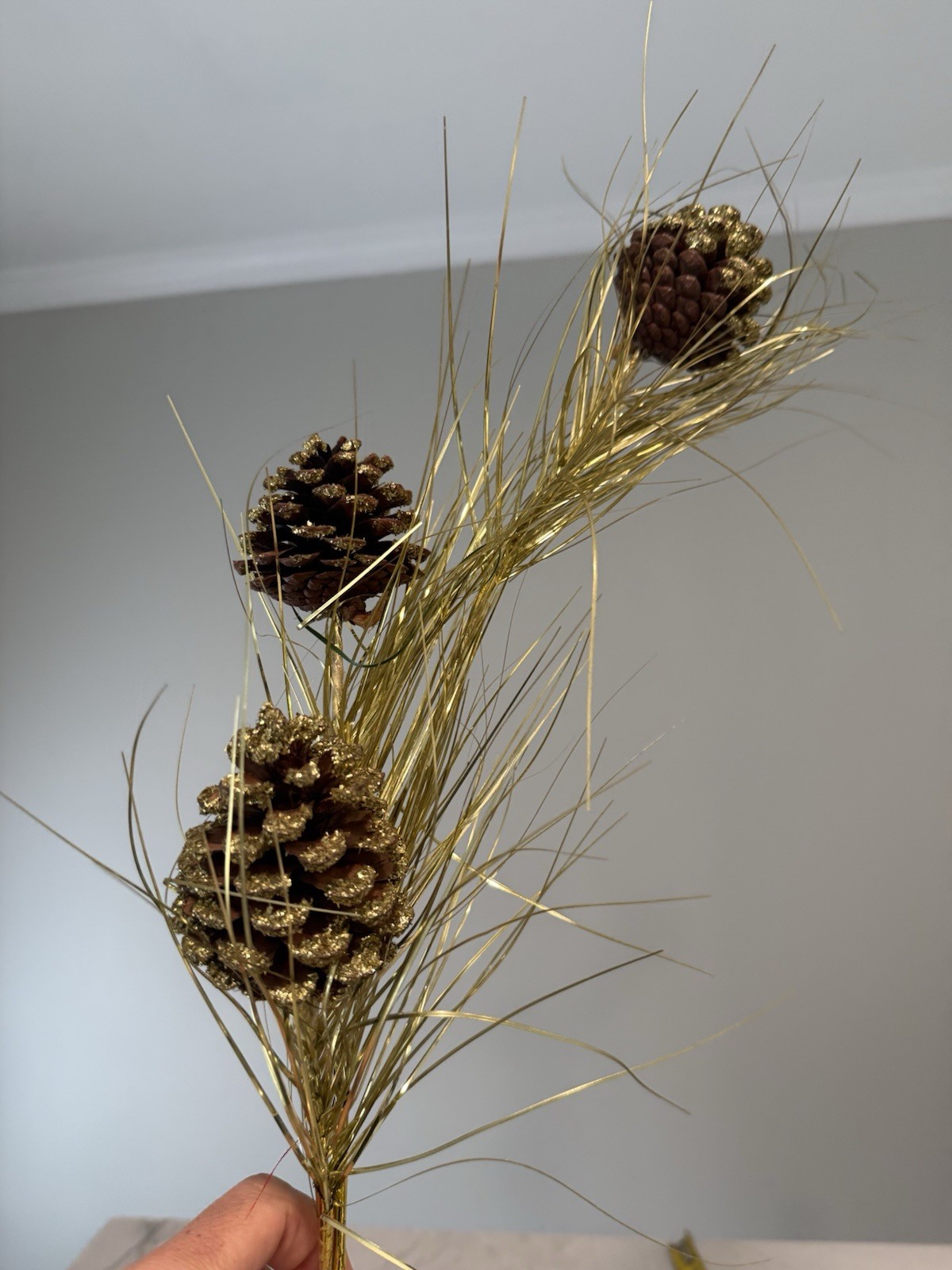 7 branches Pinecones gold green stems over 26″ long