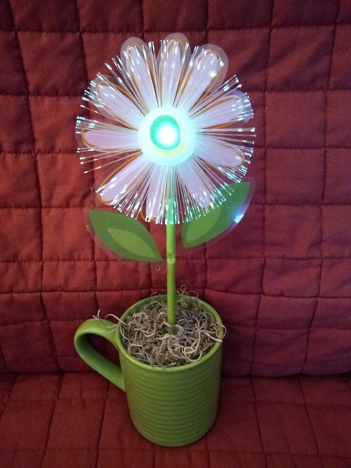 Fiber Optic Color Changing Plastic Flower Daisy in a Green Ceramic Mug Pot