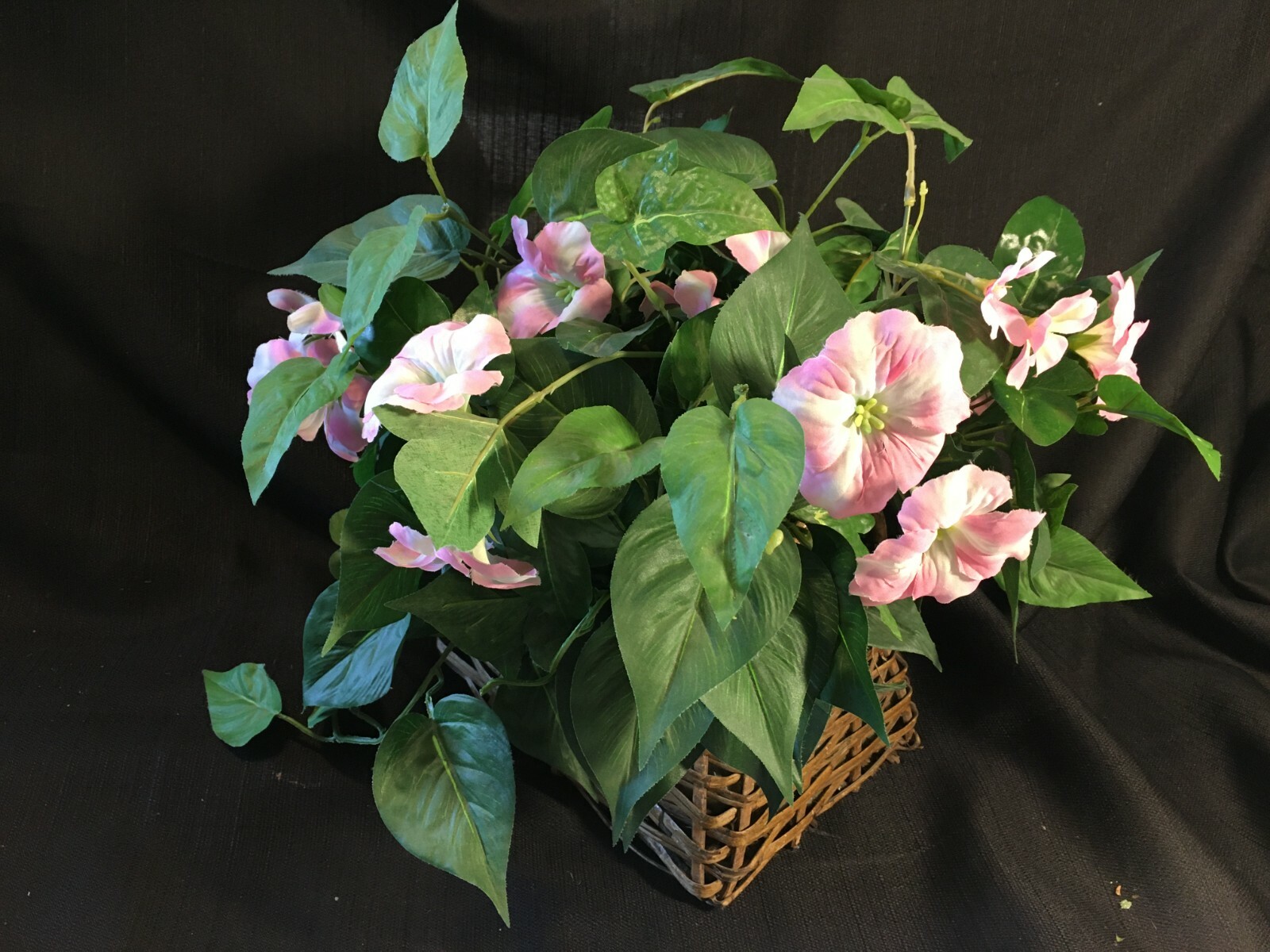 Faux Silk Pink Petunia Greenery In Brown Wicker Basket