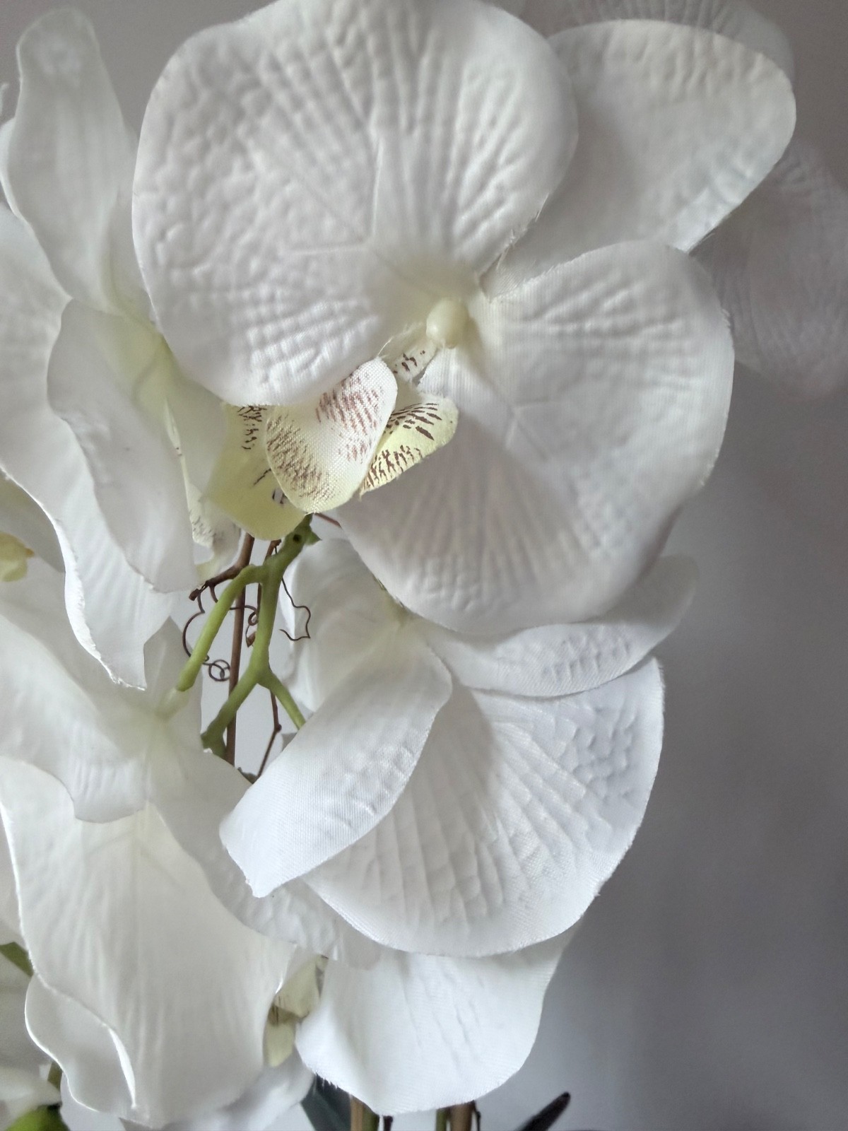 artificial white Phalaenopsis orchid arrangement in a brown textured vase 27”….