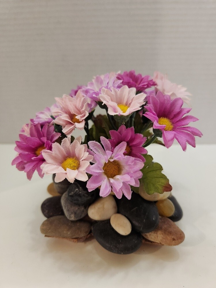 Touch of Spring, Lovely Pink/Violet Silk Flowers on a Bed of Polished Stones