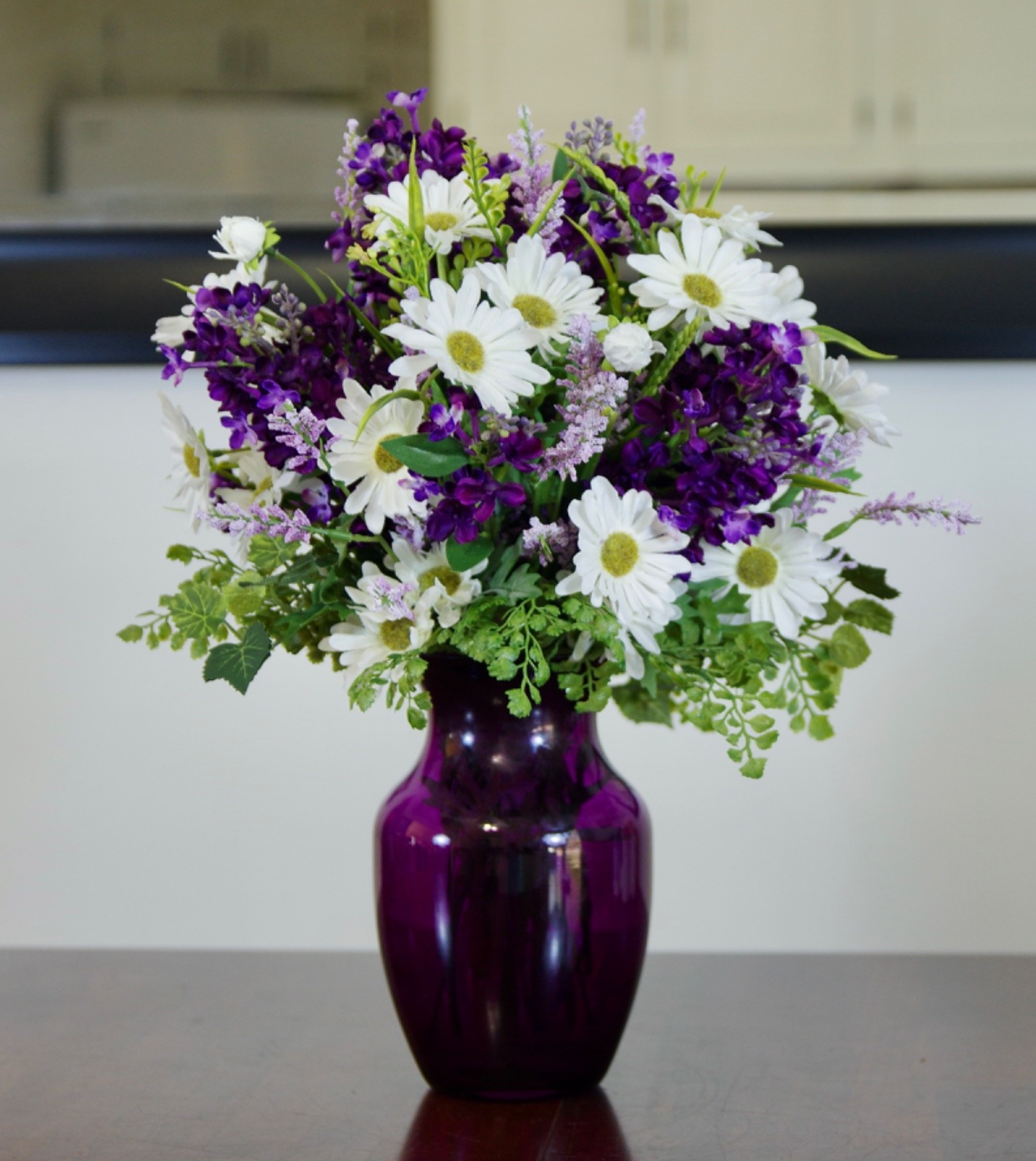 Silk Purple Lilacs and White Daisies Arrangement in a Purple Glass Vase