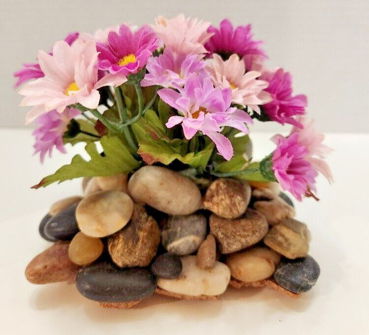 Touch of Spring, Lovely Pink/Violet Silk Flowers on a Bed of Polished Stones
