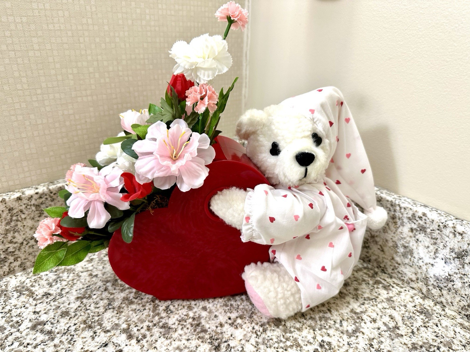 New Stunning Plush Bear In Pj With Satin Flower Arrangement In Red Heart Vase