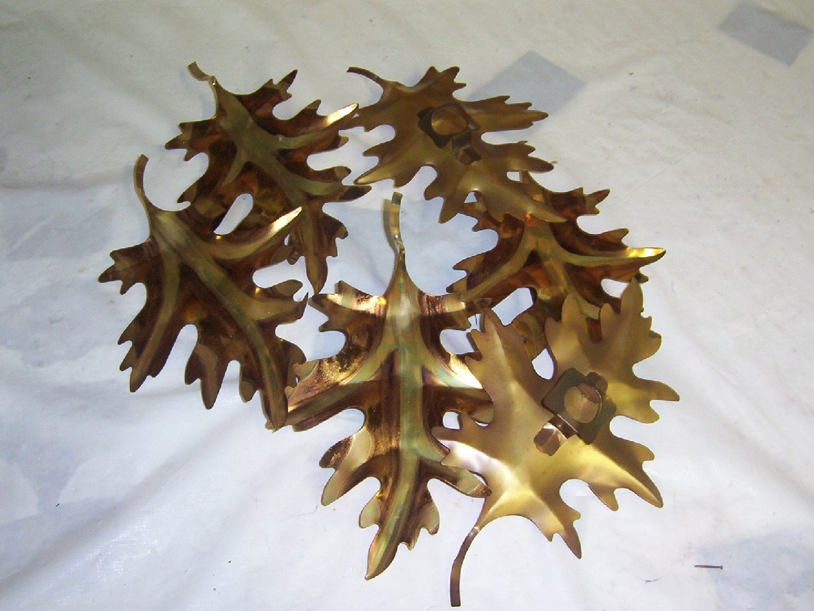 6 BRASS LEAVES AND 4 BRASS BUTTERFLIES