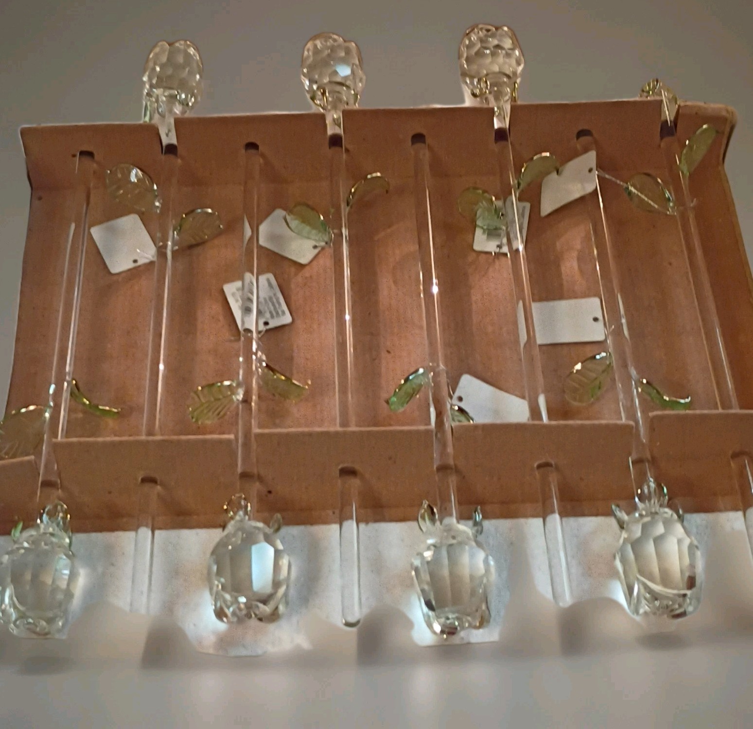 8 pc Hand blown Glass Roses with delicate green leaves on long stem.