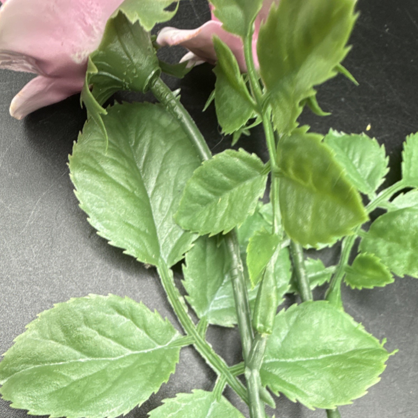 Porcelain flowers, pink roses with plastic stems and leaves