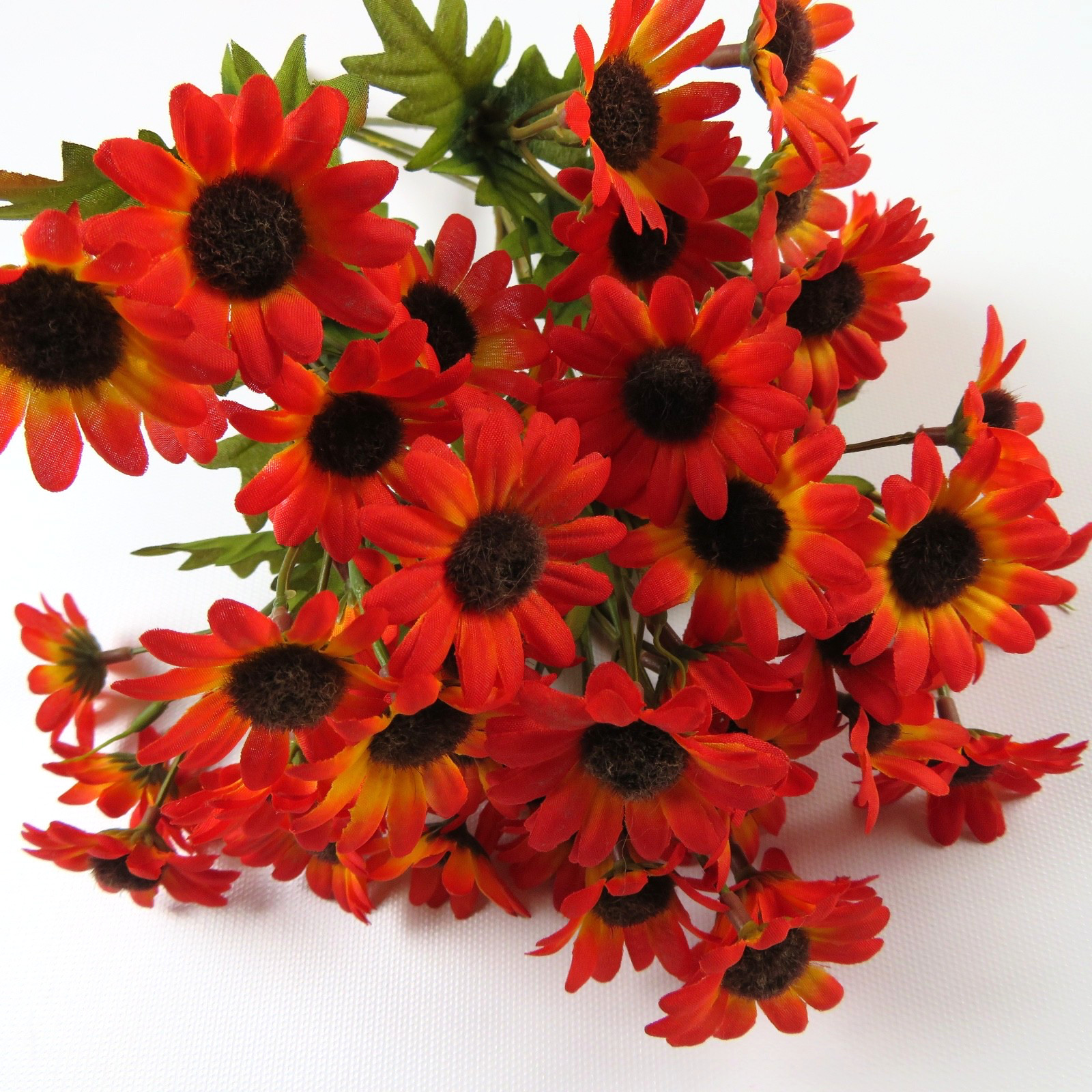 Mixed bouquet of artificial flowers, yellow & orange daisies, blue, 7 bundles