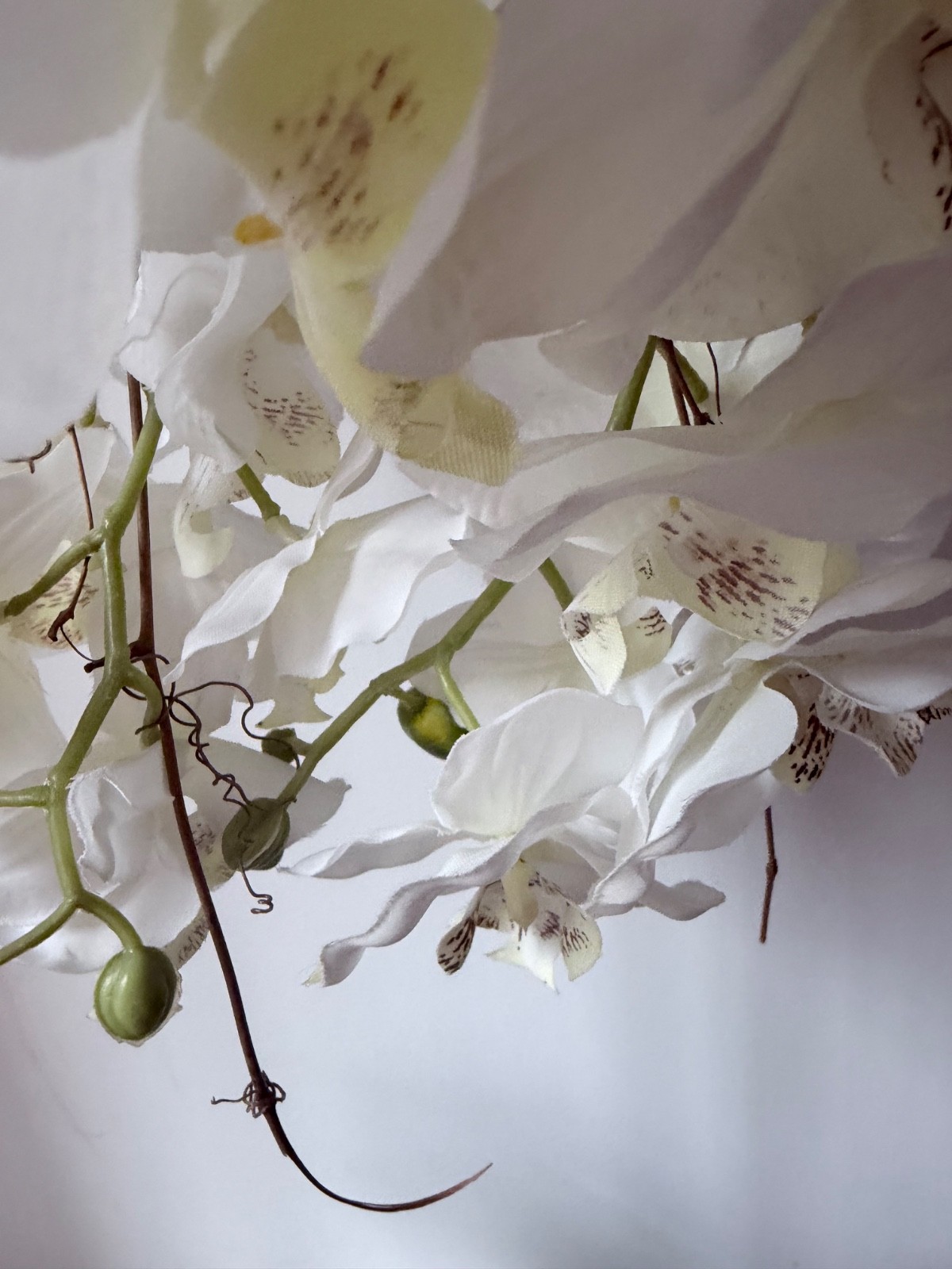artificial white Phalaenopsis orchid arrangement in a brown textured vase 27”….