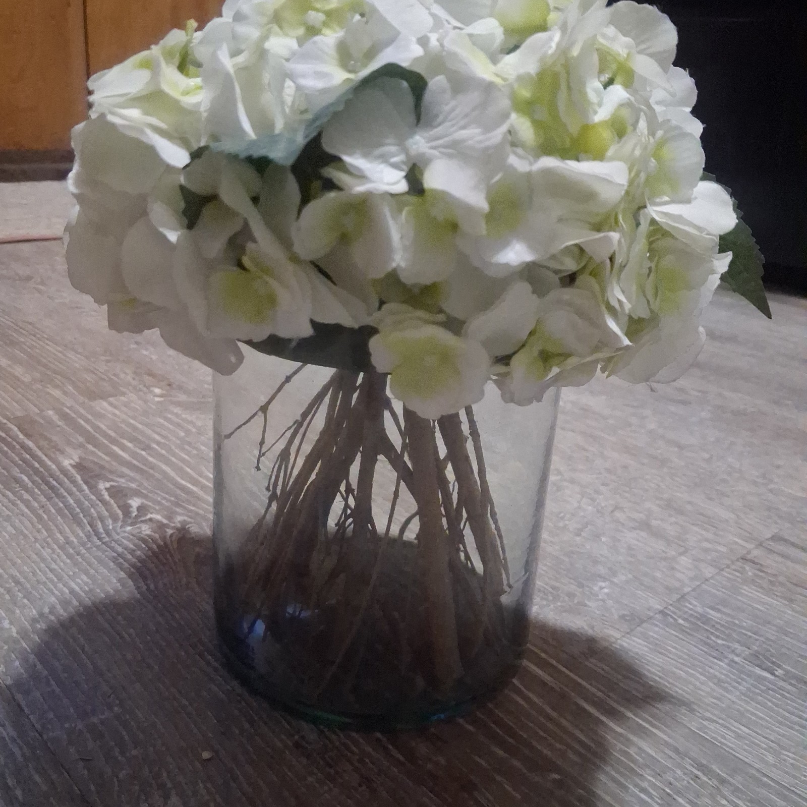 lifelike cream-white artificial silk hydrangea floral arrangement.