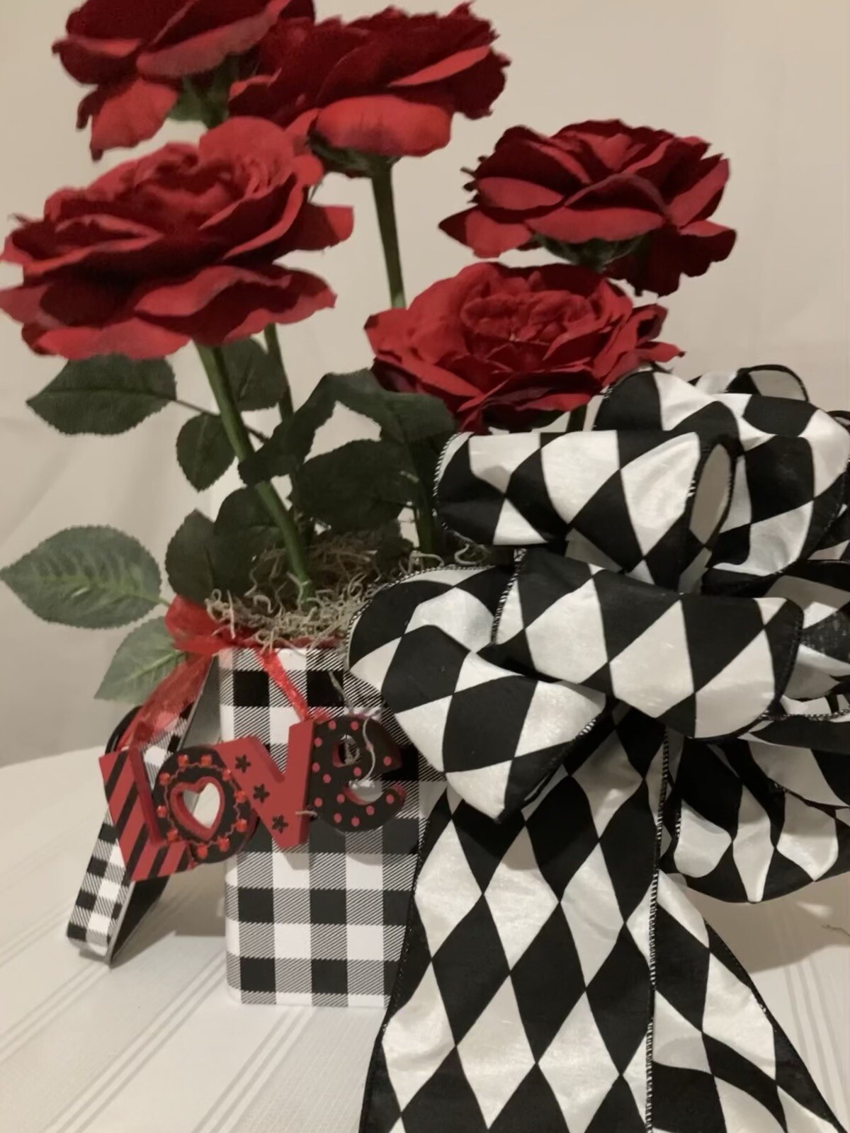 Valentine Red Roses With Black & White Checked Container