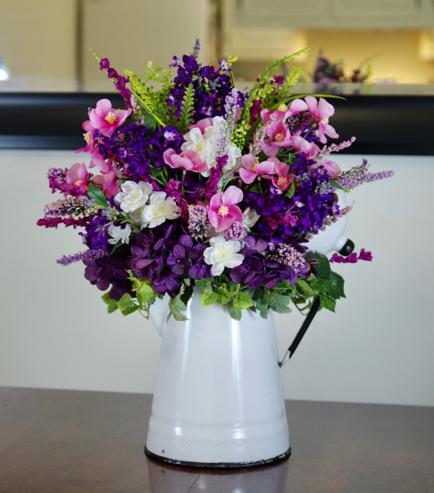 Silk Pink and Purple Arrangement in a Vintage Enamel White Cowboy Coffee Pot