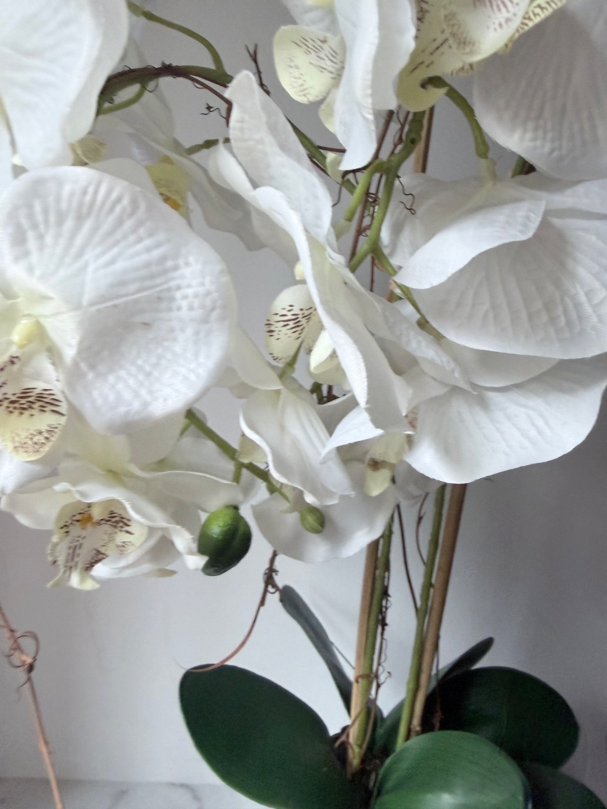 artificial white Phalaenopsis orchid arrangement in a brown textured vase 27”….