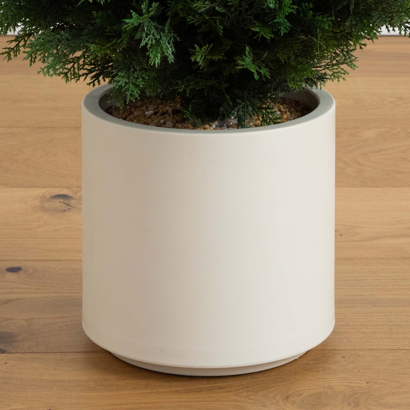 Nearly Natural 4ft UV Resistant Cedar Tree in White Planter in Green