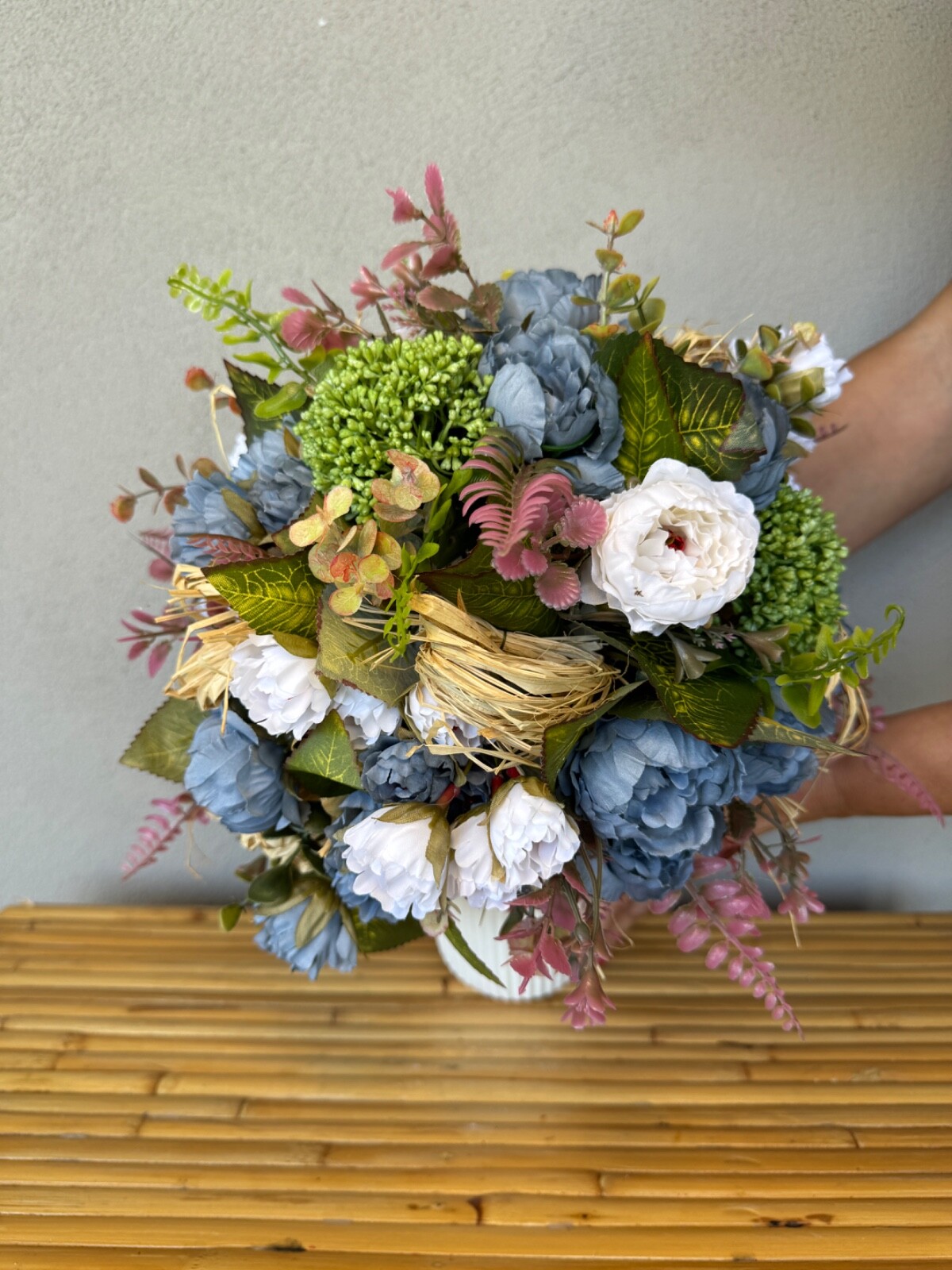 Blue and white flower arrangement in a vase , width 12’, height 15’, home decor.