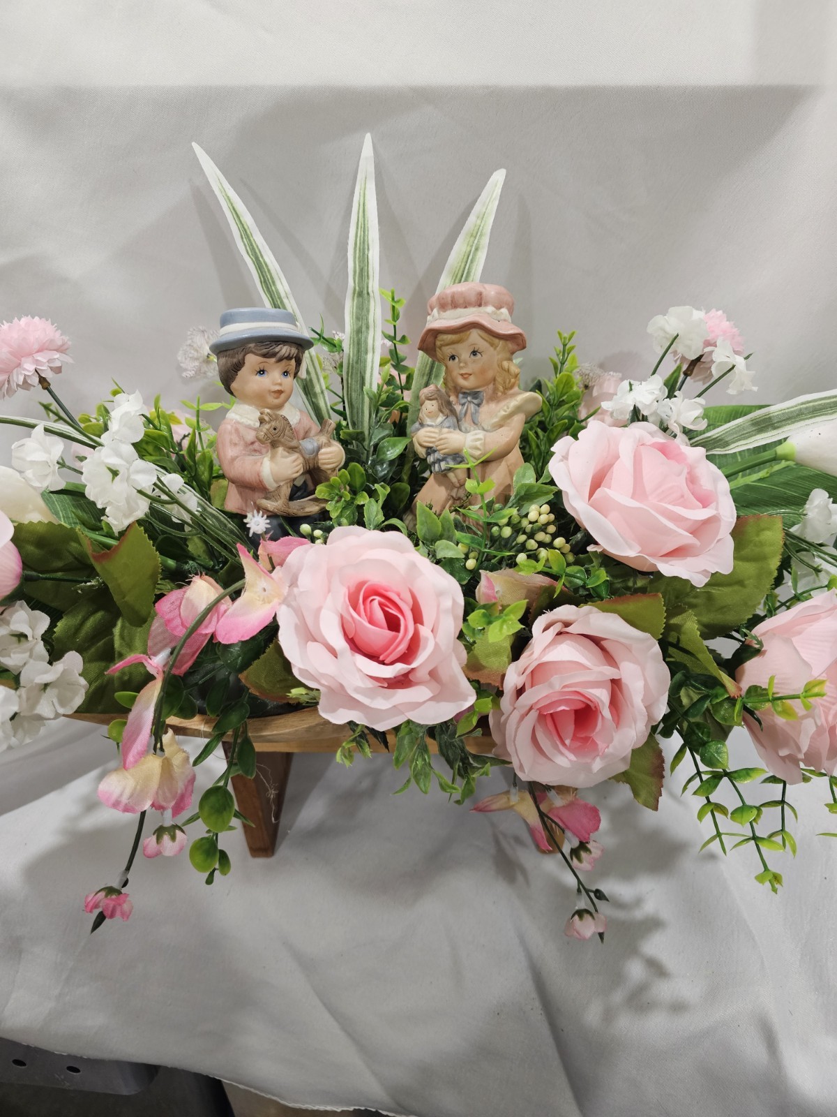Lovely Floral Centerpiece, Pink Roses, 2 darling children. 15″W in solid wood