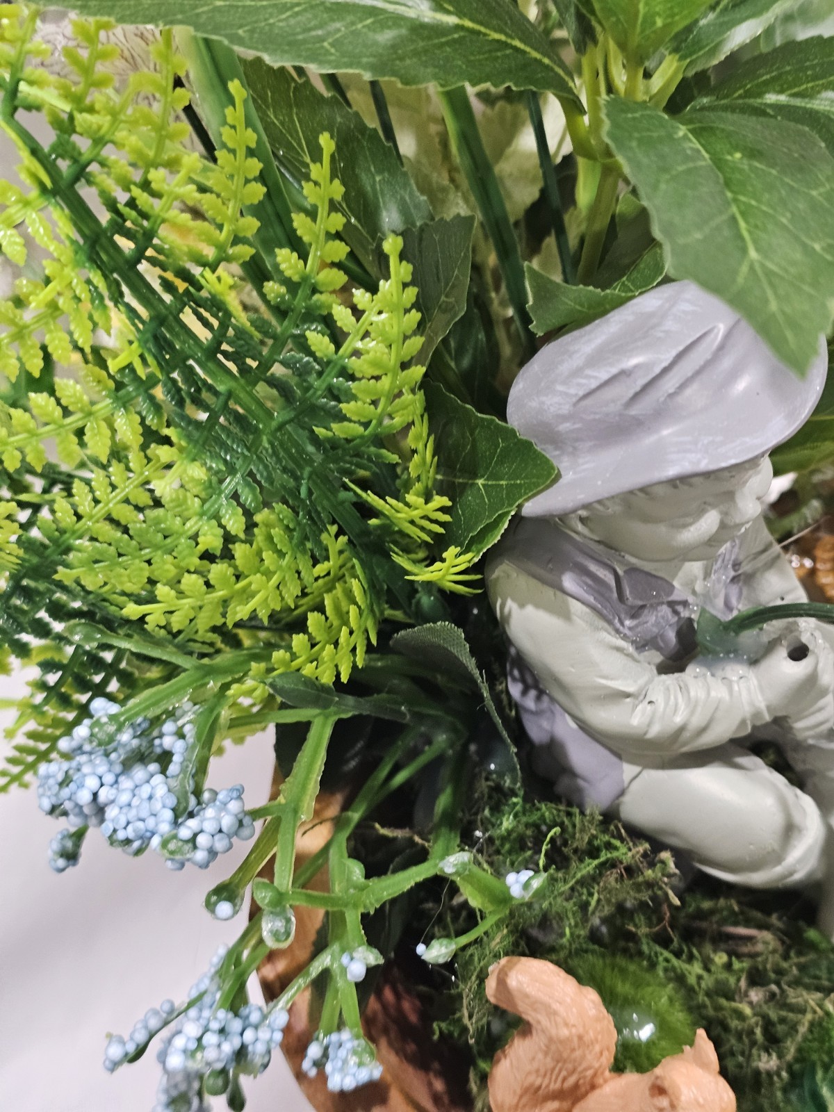 Artifical Flower Arramgement in woods, Boy Fishing Deer, Turtle Duck
