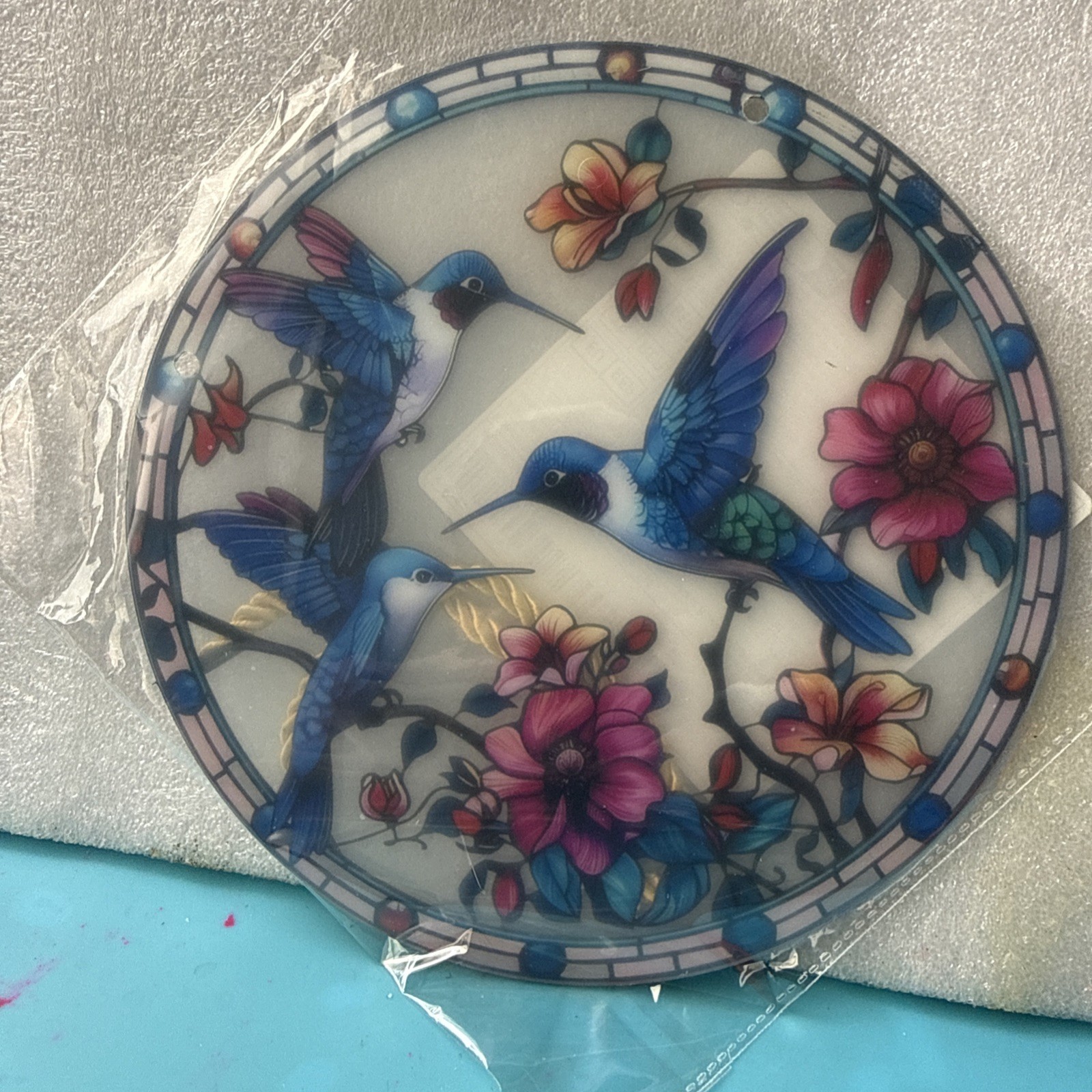 8 inch round acrylic with 3 blue hummingbird
