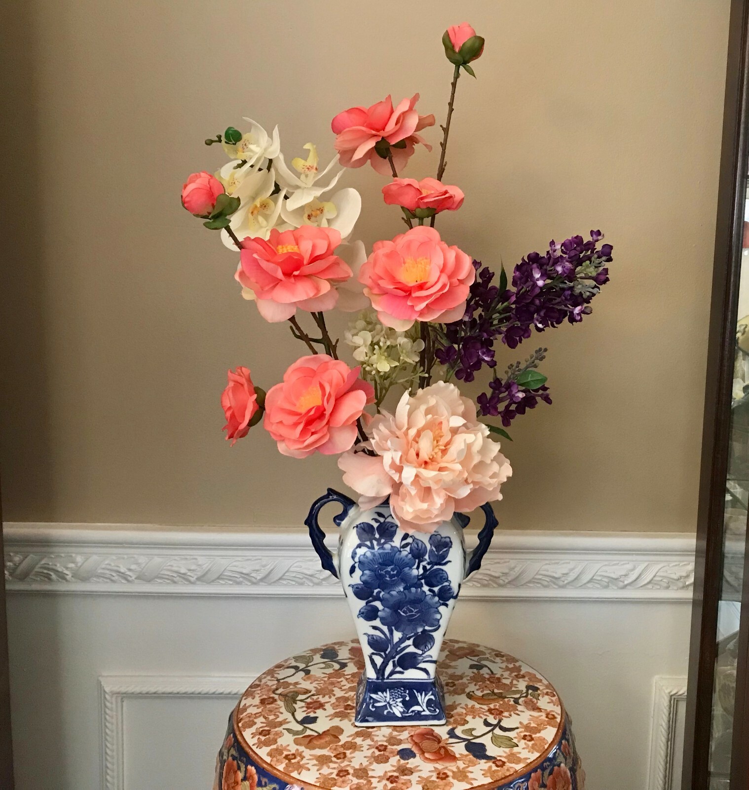Floral Arrangement with Multi-Colored Silk Flowers in a Blue and White Floral Va