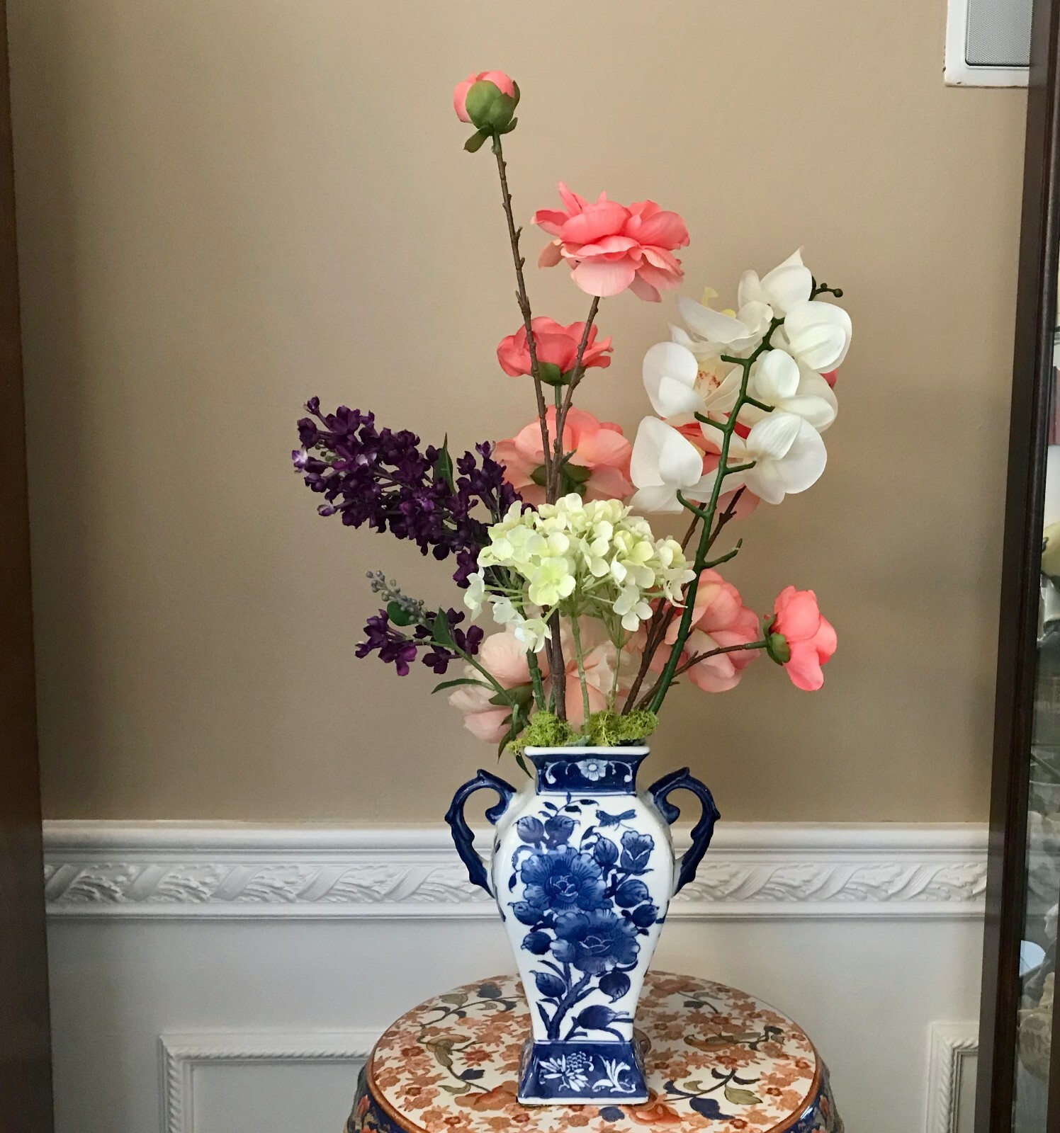 Floral Arrangement with Multi-Colored Silk Flowers in a Blue and White Floral Va