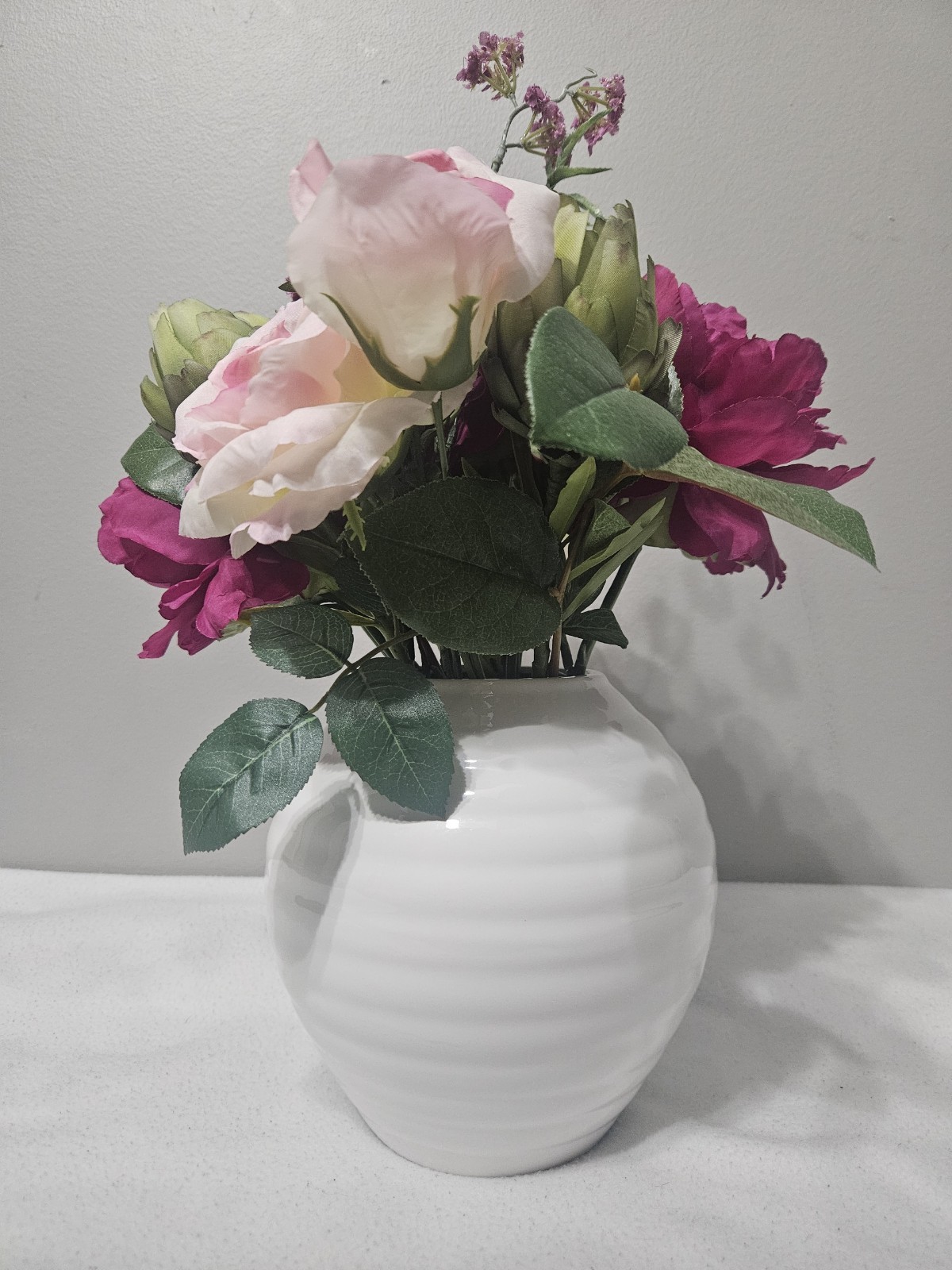 Vintage Flower Arrangements in White Ceramic Vase with Faux Water