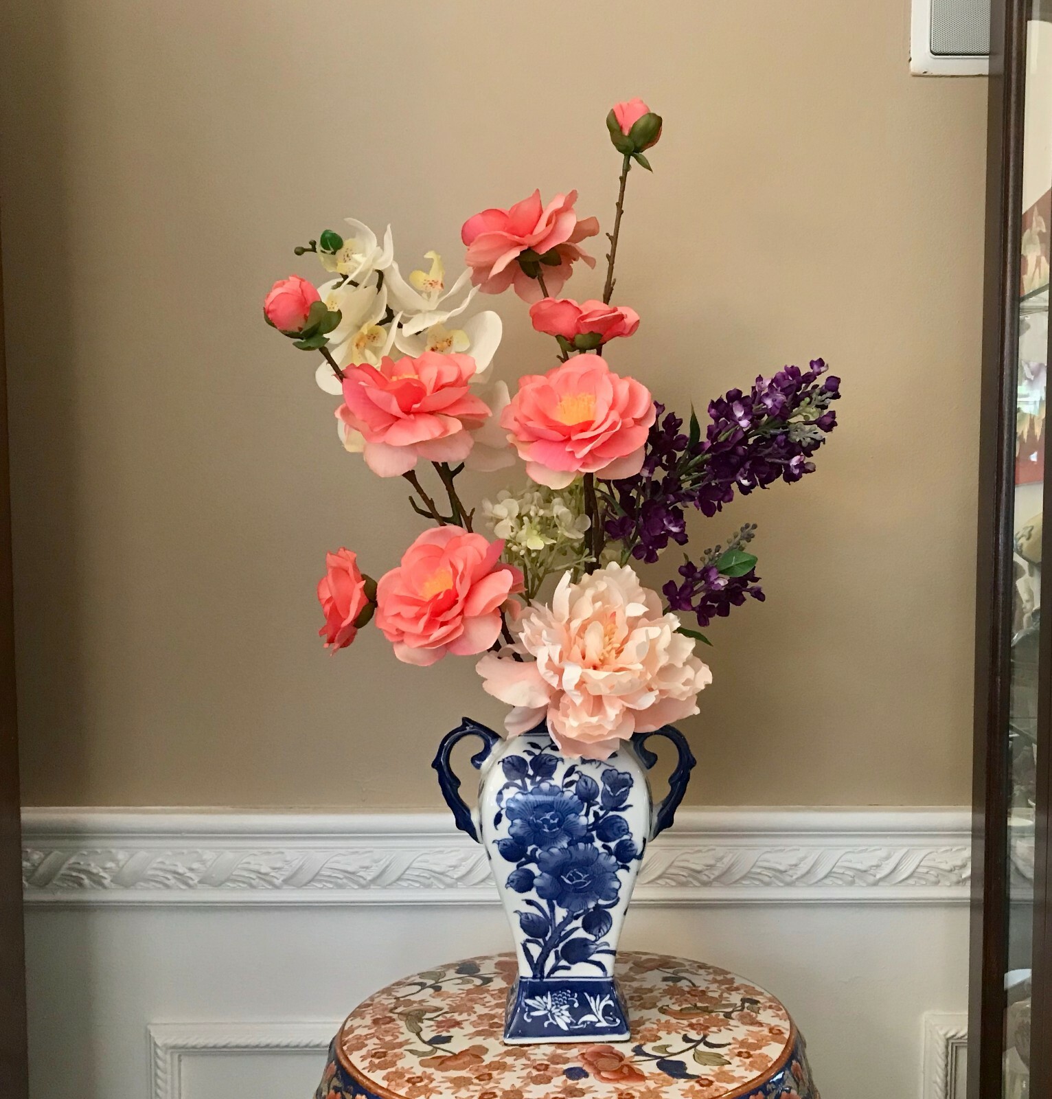 Floral Arrangement with Multi-Colored Silk Flowers in a Blue and White Floral Va