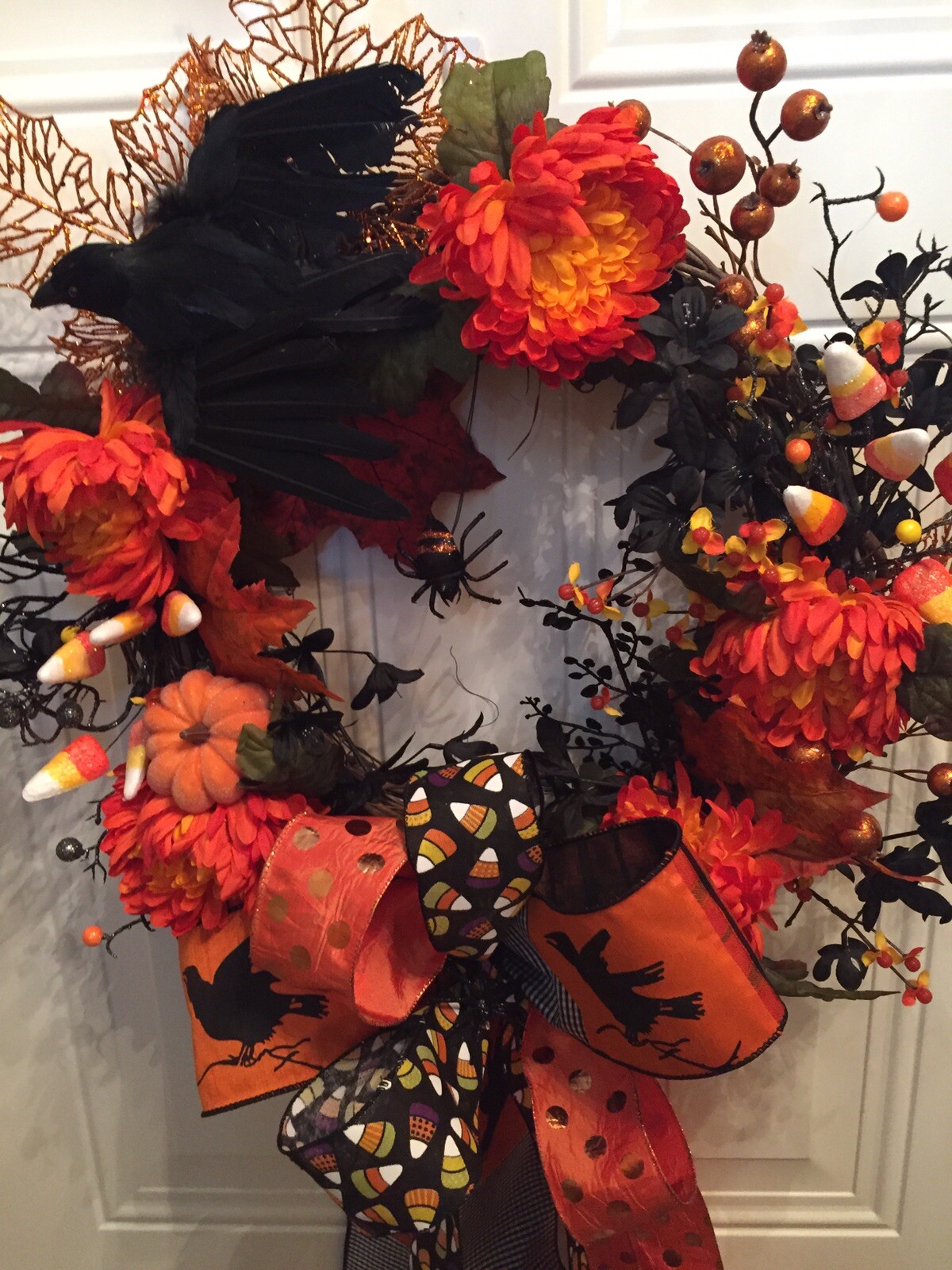 Halloween Spooky Wreath With A Black Evil Crow And Creepy Black Spiders