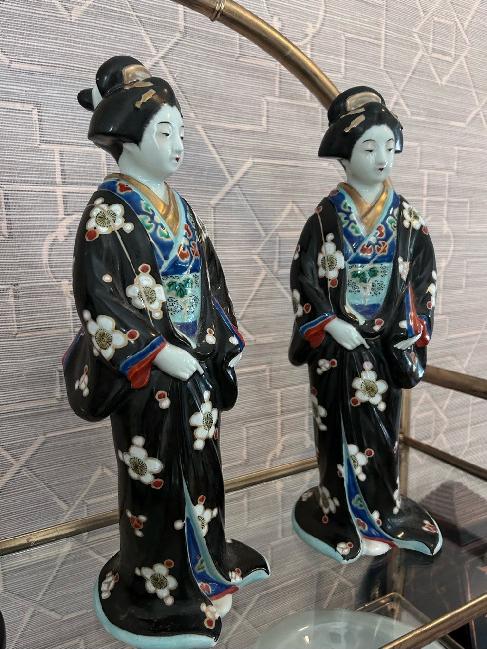 Pair of Black Porcelain Geisha Figurines with Multicolor Accents
