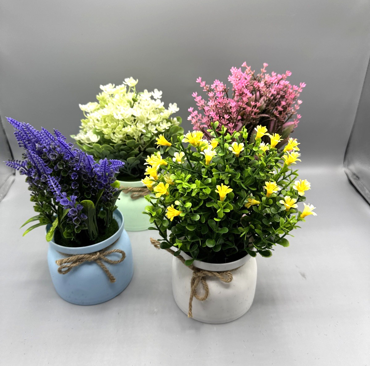 4 Pack Fake Flowers Small Artificial Faux Plants in Plastic Macaron Pots