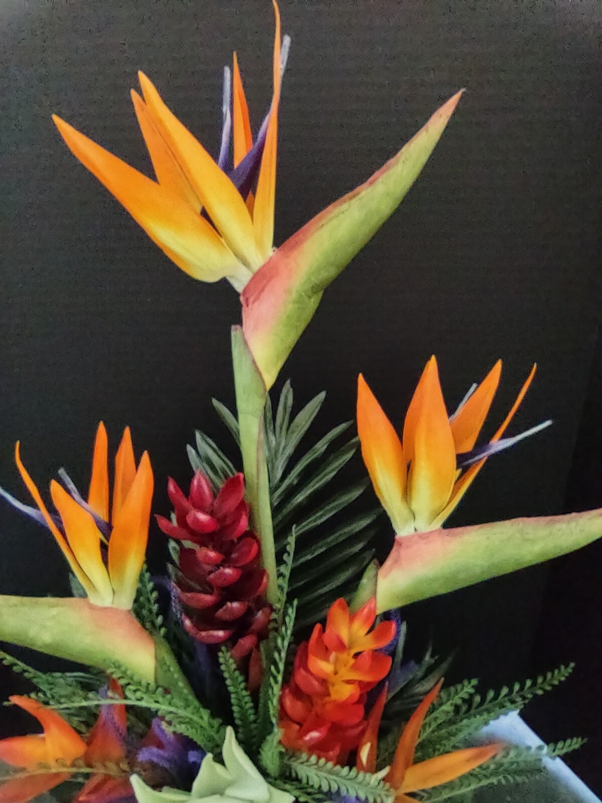 Artificia ltropical floral arrangement