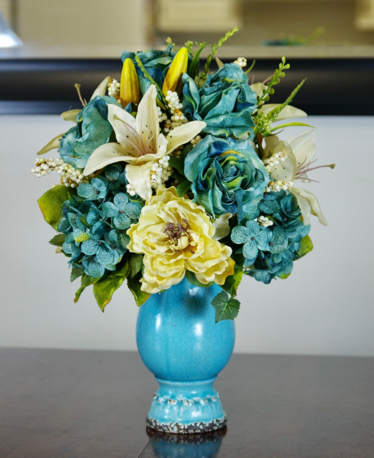 Silk Arrangement of Blue Roses, Hydrangeas and Beige Lilies in Blue Ceramic Vase